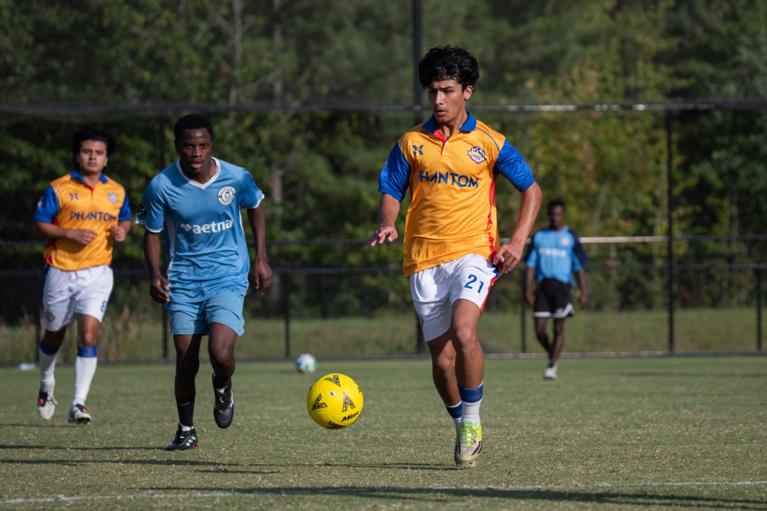 Phantom FC player advancing with the ball