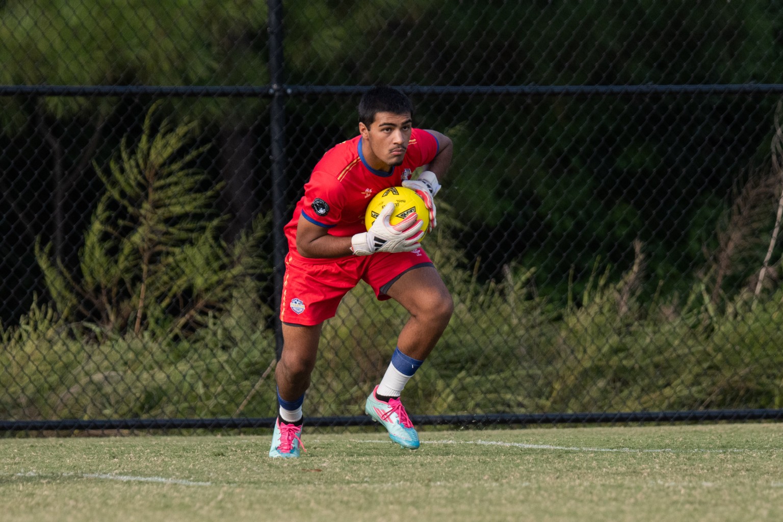 Phantom FC goalkeeper securing the ball