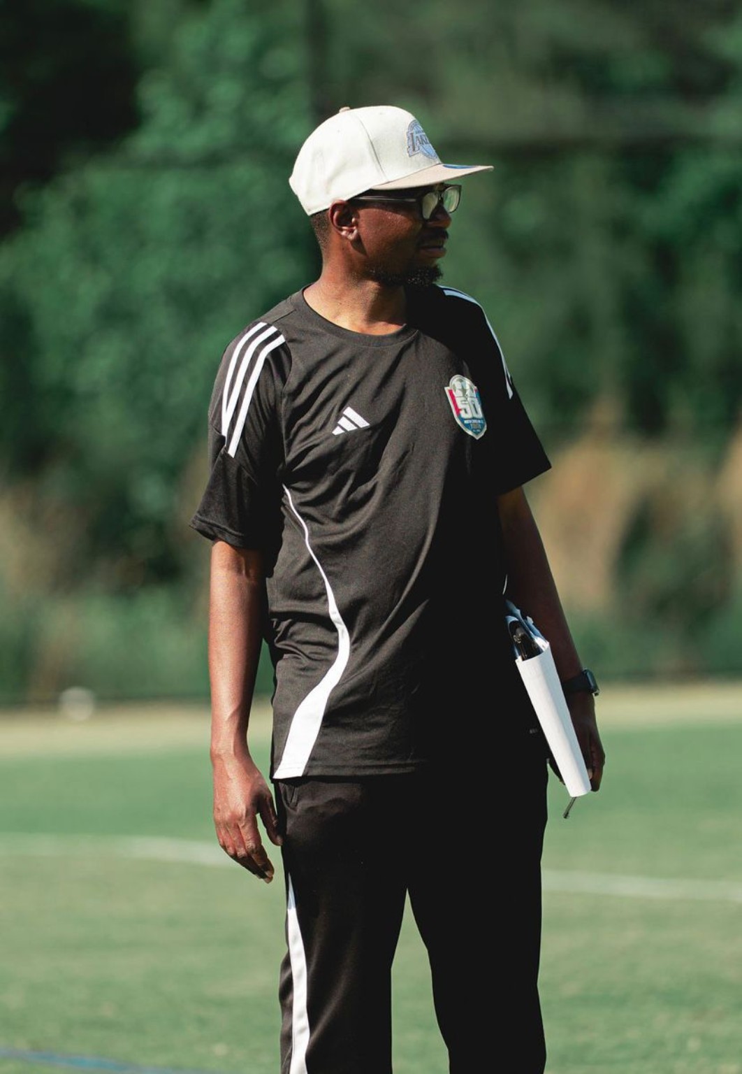 Phantom FC head coach watching from the touchline